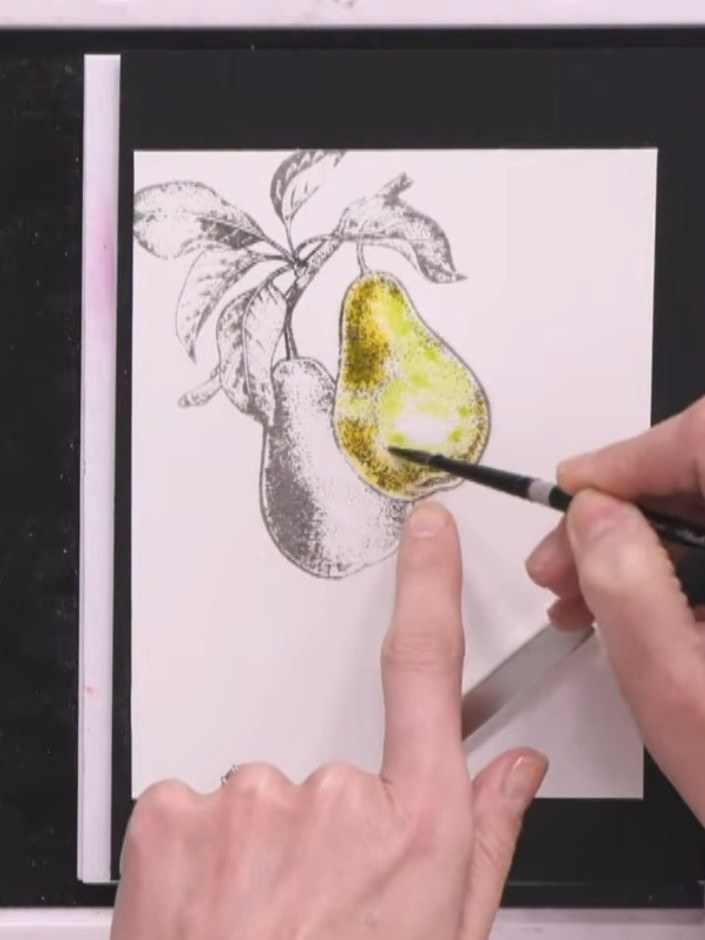 Step 6: If you create a puddle of excess water, squeeze out your brush on a tissue and use the dry brush to lift the w