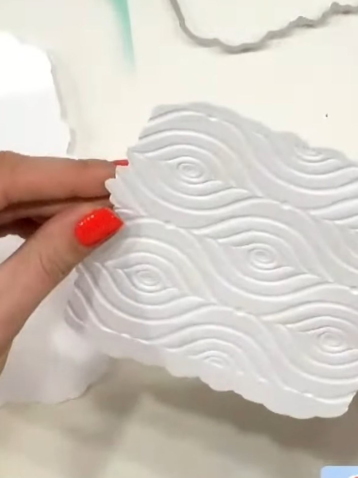 Step 3: Flex the scored piece back gently and glue it to the back of the second die-cut piece to create the shaped car