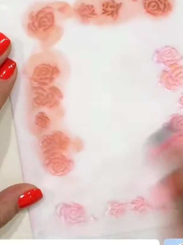 Step 4: Position stencil number four over your card and hold it firmly in place. Using your chosen ink colour, press t