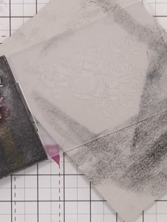 Step 9: Apply gold ink pad around the edges and embossed design areas of the background panel to add metallic highligh