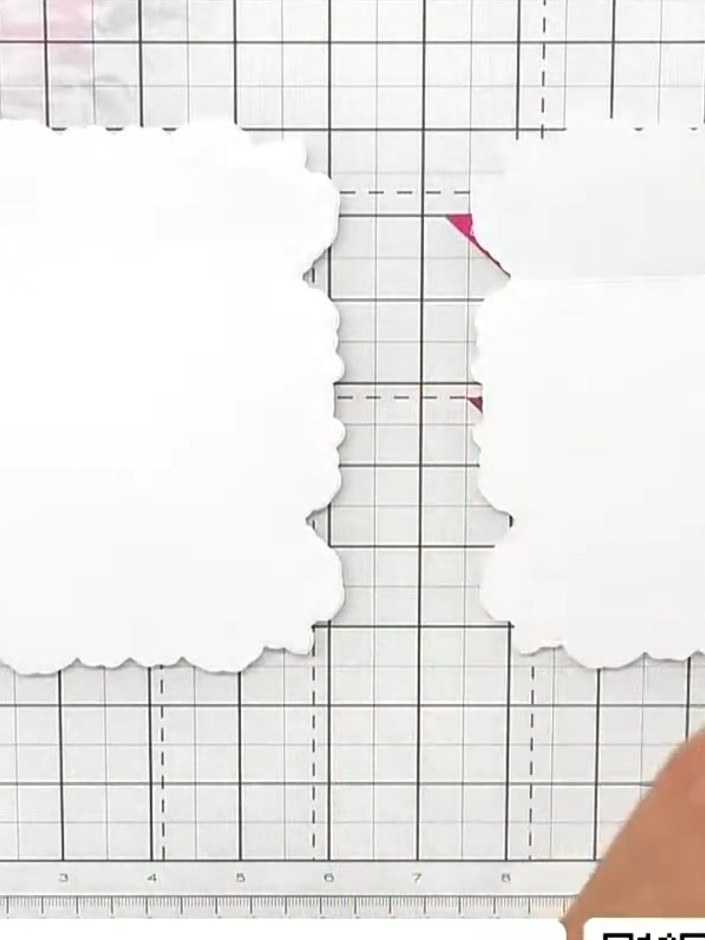 Step 3: Tape the two pieces of the shaped card together along the score line. Use double-sided tape on the hinge area 