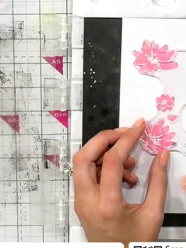 Step 6: Carefully pop out the die-cut pink bloom from the carrier sheet. The flower should release cleanly from the su