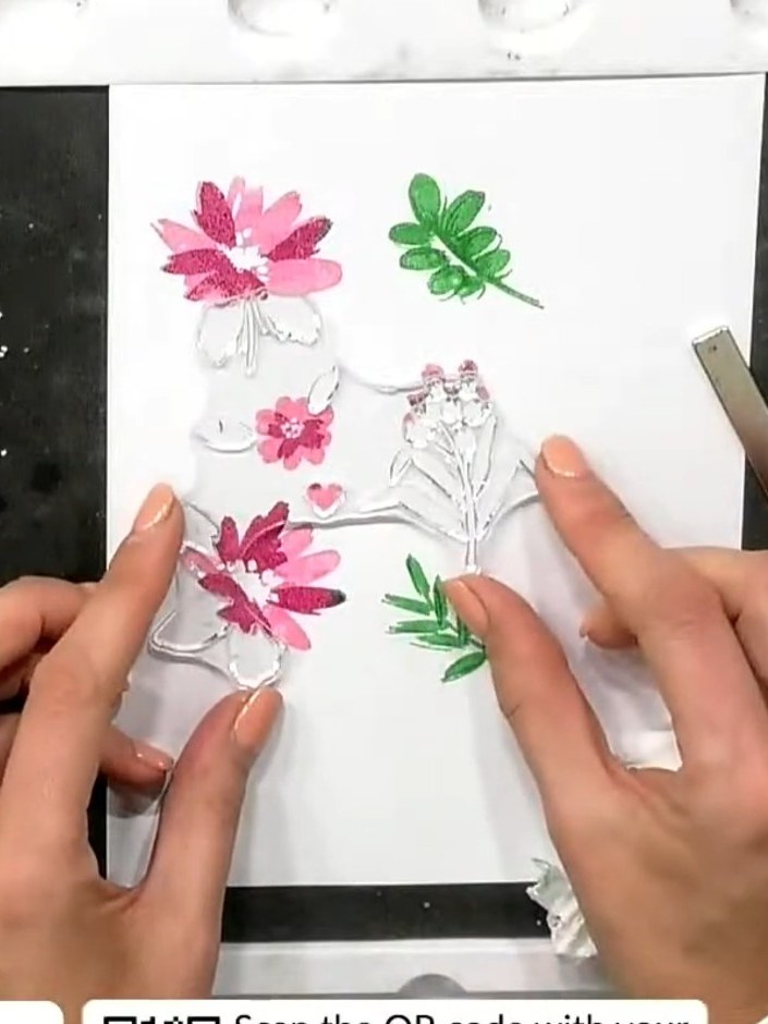 Step 7: Adhere the finished layered bloom to your card base using double-sided tape or foam pads for added dimension. 