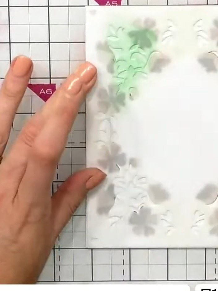 Step 3: Line up the heart registration marks on the stencil with your previous layer. Apply the second stencil layer u