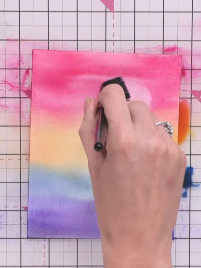 Step 5: If the colour won't lift easily, wet your brush again to reactivate the paint. Then use a dry brush to lift th