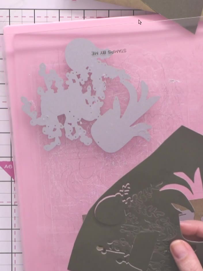 Step 3: Carefully remove all die-cut pieces from the magnetic glass plates. Take care to remove the small floral fille