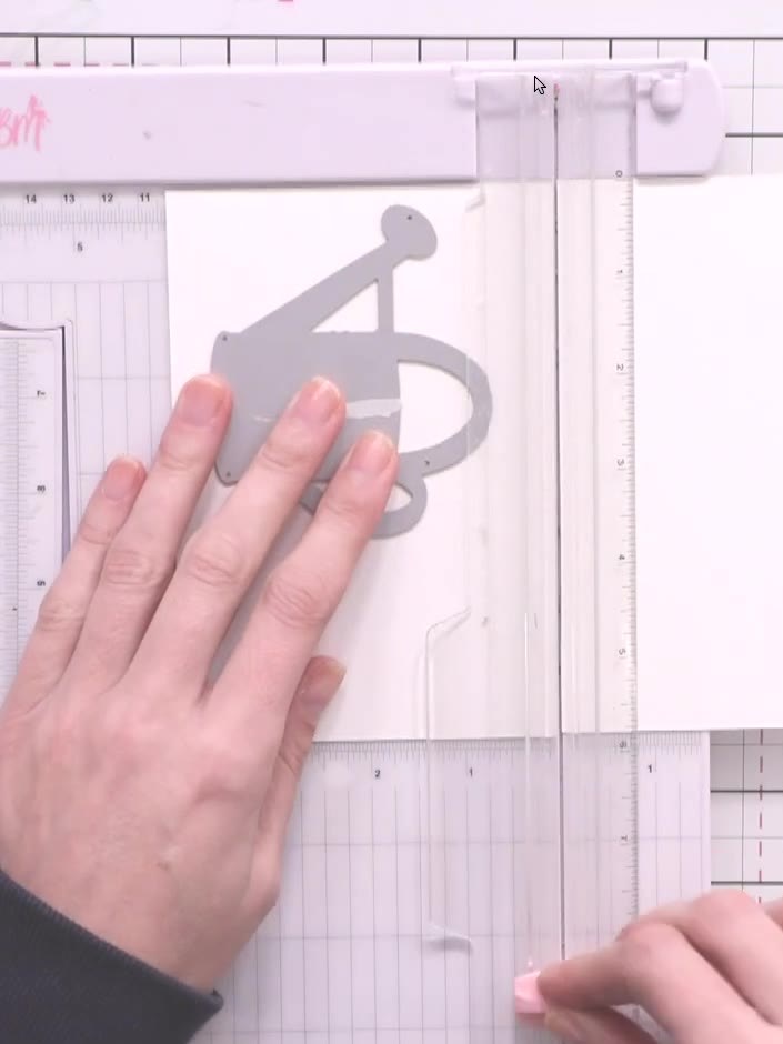 Step 1: Cut a piece of white watercolour cardstock in half to create your base for inking.