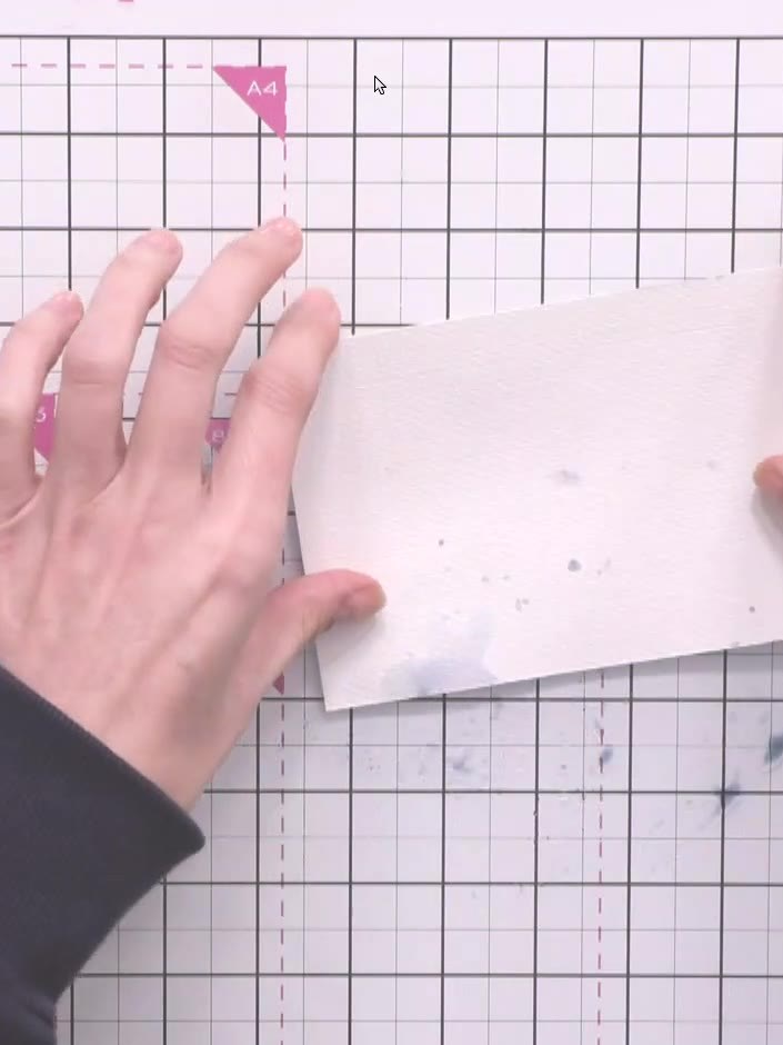 Step 5: Apply a second layer of Stormy Sky ink by picking up excess ink from the craft mat with your finger and dabbin