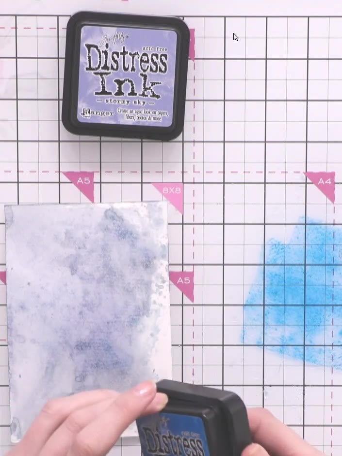 Step 7: Apply Mermaid Lagoon Distress Ink to the watering can image using the ink pad directly on the paper. Build up 