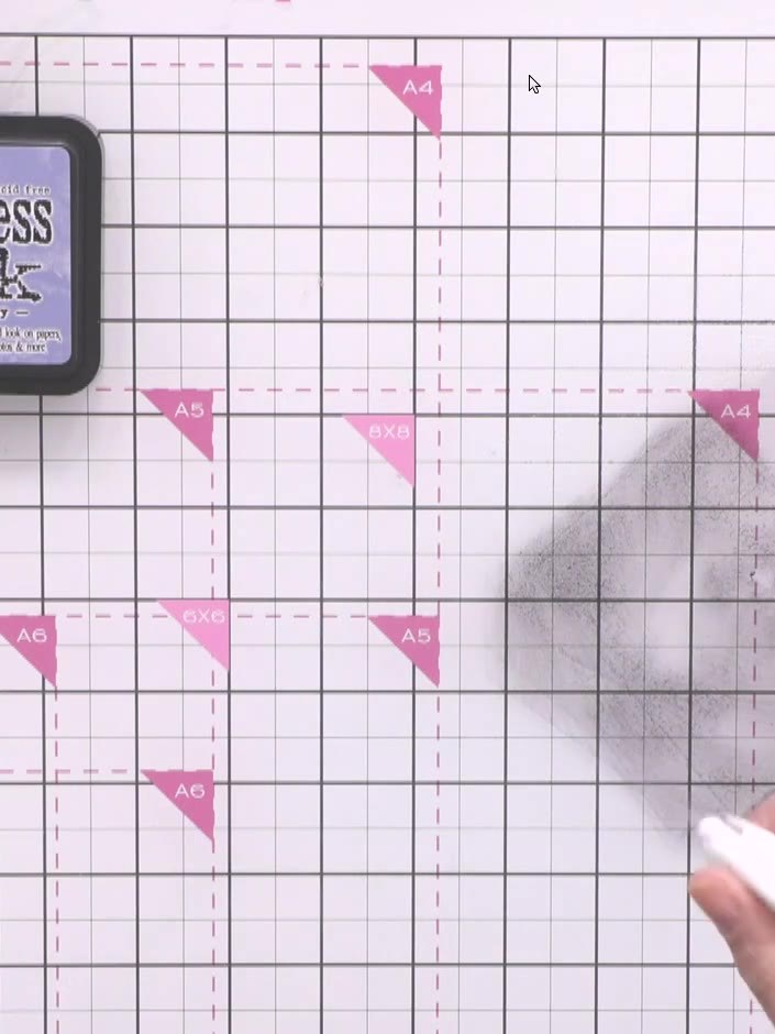 Step 8: Pick up dark grey or black ink on your blending tool and apply it to the edges and darker areas of the image t
