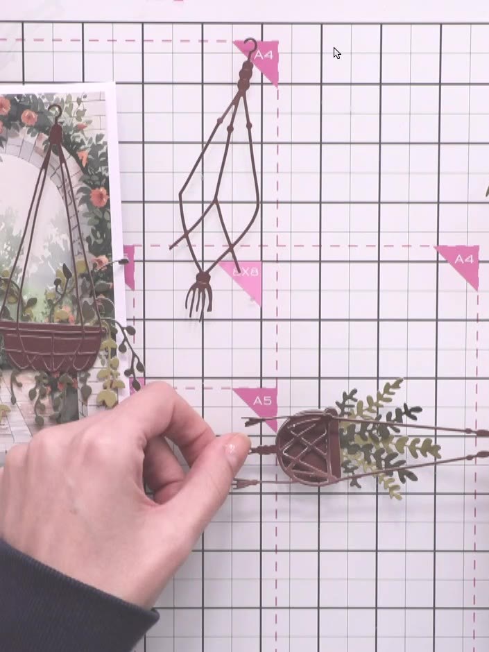 Step 5: Cut a second hanging basket from a different shade of brown cardstock. This will create variation in your gard