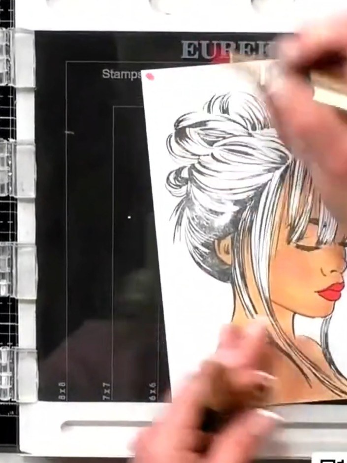 Step 1: Stamp the Empower girl portrait onto your white card base using black ink. Position the stamp carefully and pr