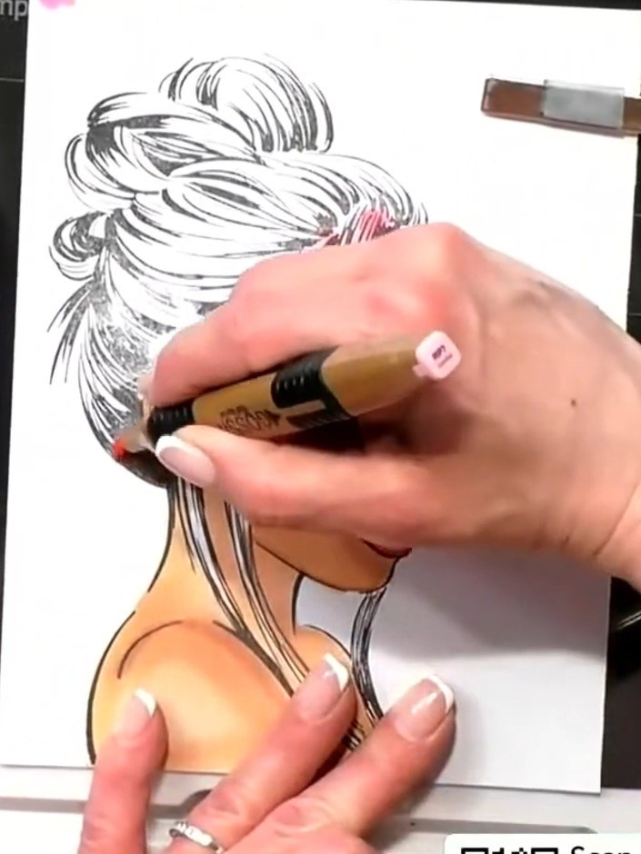 Step 2: Select two consecutive marker shades in similar tones and use them to add shading to the hair, working with th