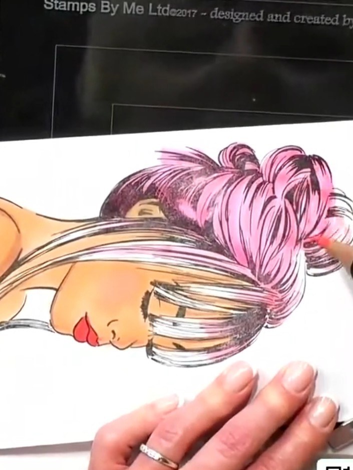 Step 6: Use a white gel pen to add final highlights and details to the hair and face of the portrait. Add fine white l