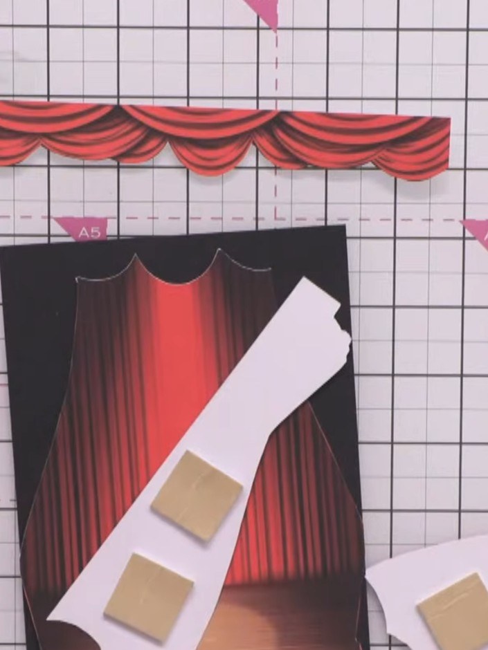 Step 3: Apply double-sided foam pads to the back of the curtain pieces. This will add dimension and lift them away fro