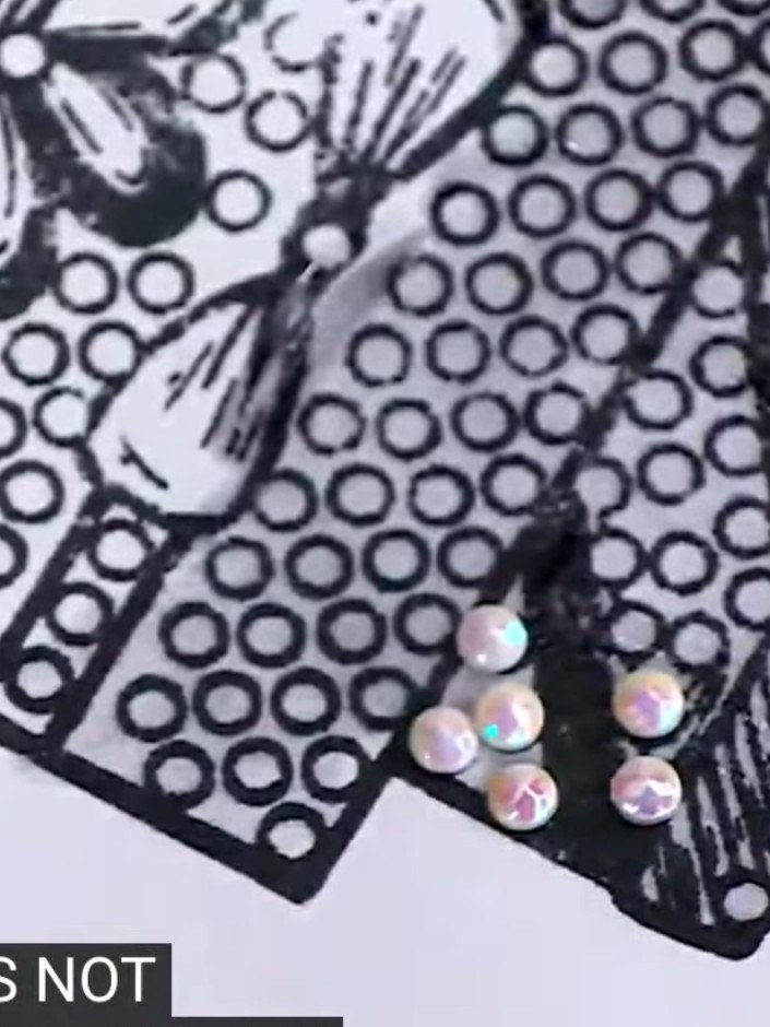 Step 7: If you place a crystal slightly outside the lines, gently nudge it into position whilst the magic glue is stil