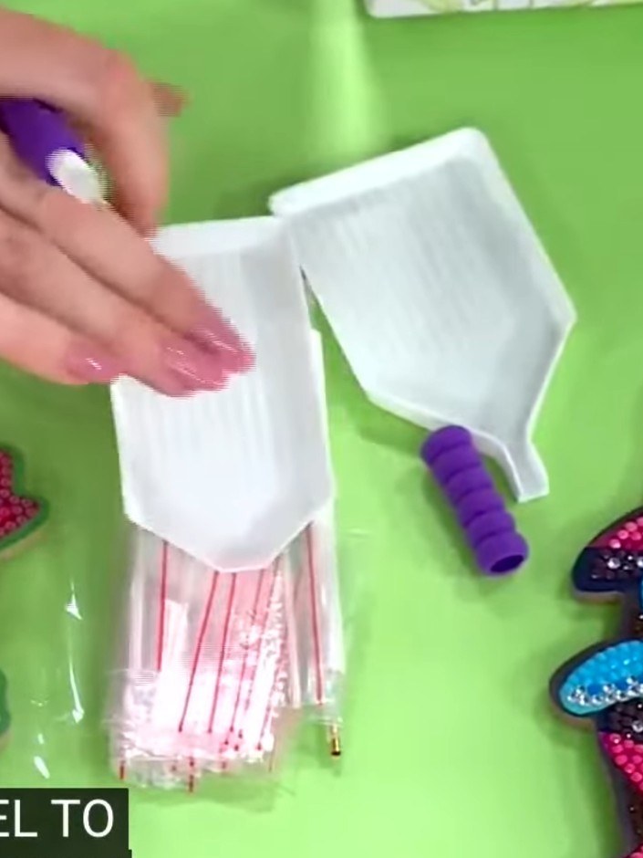 Step 6: Use the purple finger holders included in the kit to keep your hands comfortable during the crafting session. 