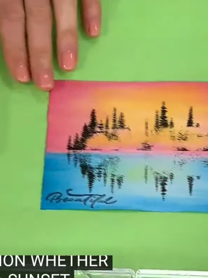 Step 6: Add sparkle powder to areas where light would naturally reflect, such as on the moon and in the water reflecti