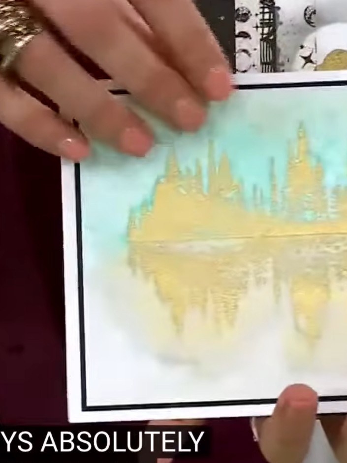 Step 3: Use a heat tool to melt the embossing powder until it transforms into a glossy, sparkly finish. Move the heat 