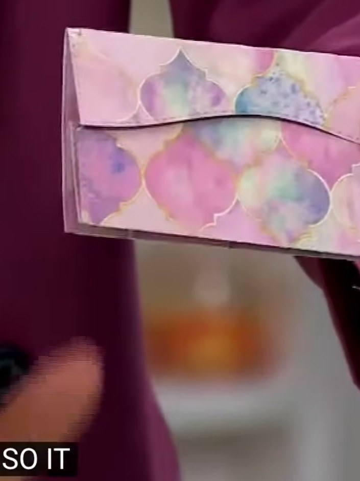 Step 1: Tear out the pre-cut paper piece from the Pretty in Pink paper collection. The paper features a watercolour de