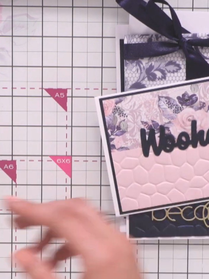 Step 4: Layer the stamped and die-cut elements onto your card base. Use the 'with love' sentiment strip, the floral pa