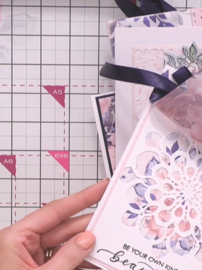 Step 6: Add a vellum overlay from the Midnight Blooms collection to the front of your card. Position it over your laye