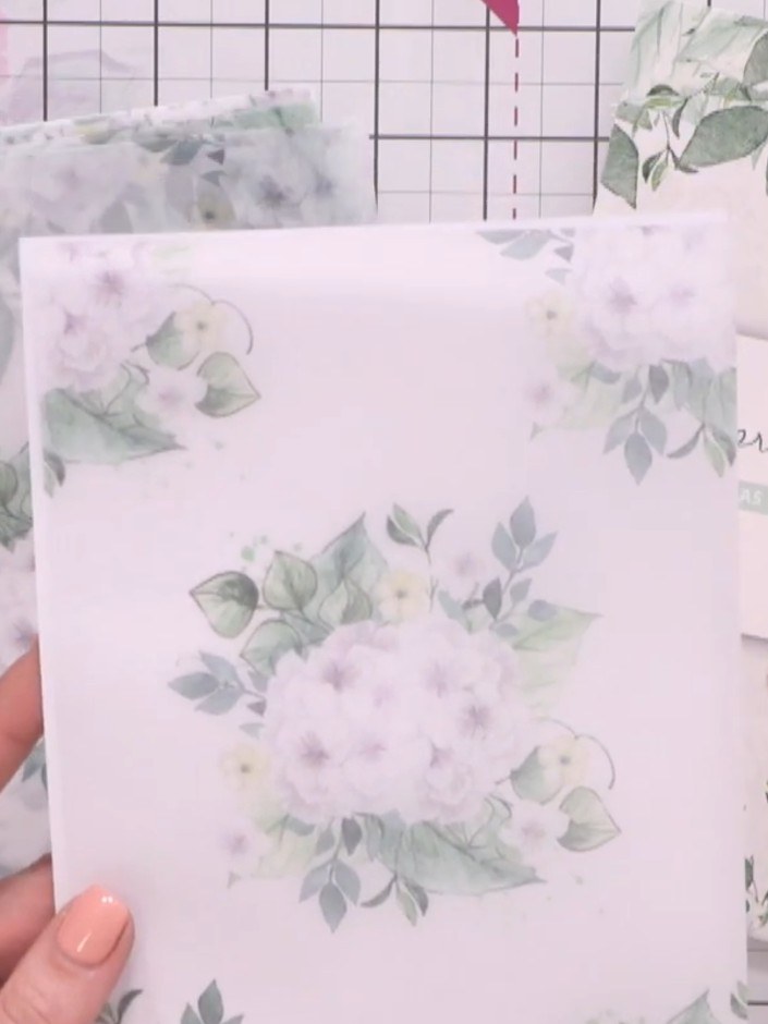 Step 3: Stamp the Spring Morning design elements onto your card base using the floral and leaf designs from the stamp 