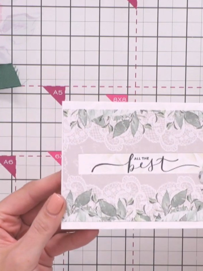 Step 7: Apply adhesive foam pads to the back of your die-cut elements. Position them on the card front to add dimensio