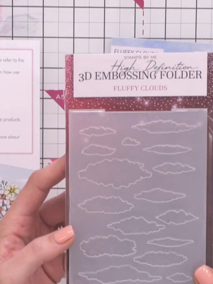 Step 5: Run your card through an embossing machine with the Fluffy Clouds 3D embossing folder to create dimensional cl