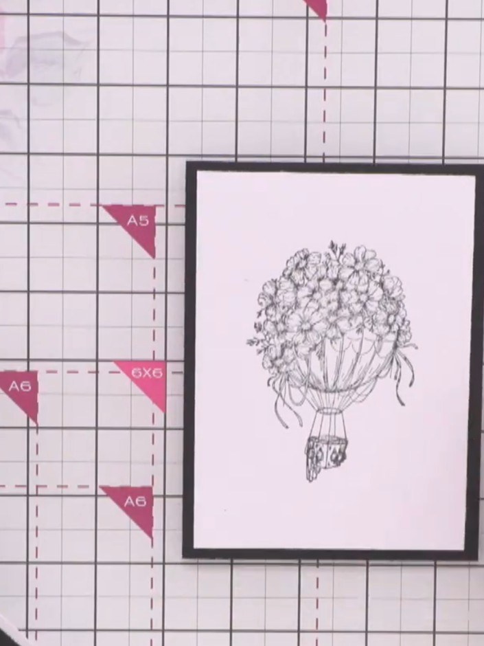 Step 7: Add your chosen sentiment stamp from the coordinating stamp set to complete your hot air balloon card design. 