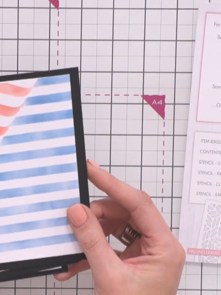Step 4: Layer decorative papers from your chosen collection over the stencilled background to create depth and interes