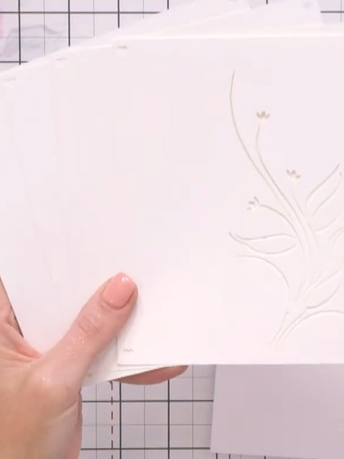 Step 1: Remove all four numbered stencils from the packet. Locate the small heart registration marks in the corners of