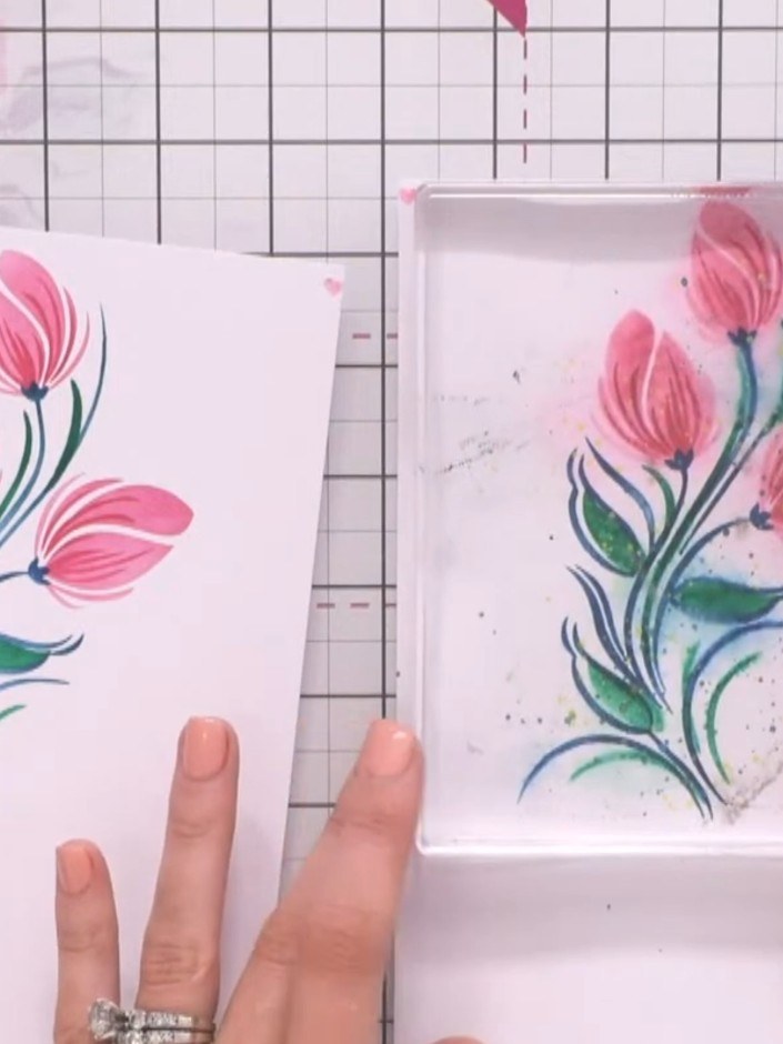 Step 12: Use the coordinating die to cut out the layered tulip design. Mount the die-cut piece onto a contrasting card 