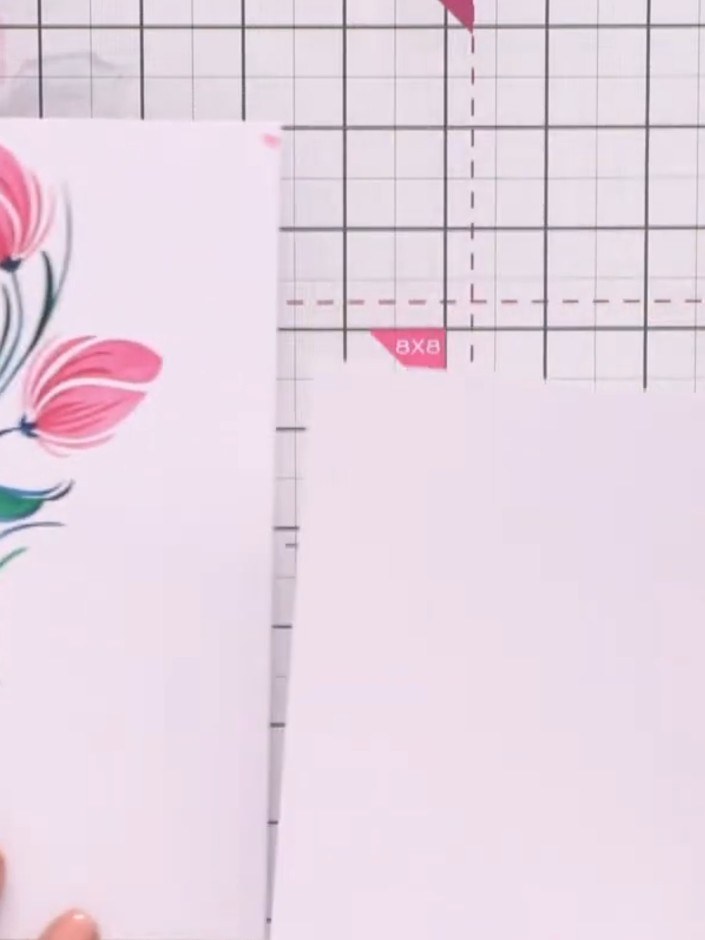 Step 8: Place the stencil on a fresh piece of white card. Using the ink pad, apply the first layer of the tulip design
