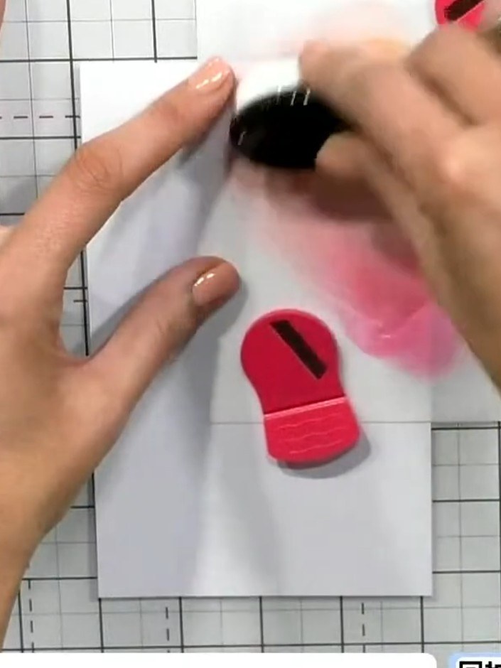 Step 3: Apply pink ink to the upper portion of the card using a blending tool, working it into the orange to create a 
