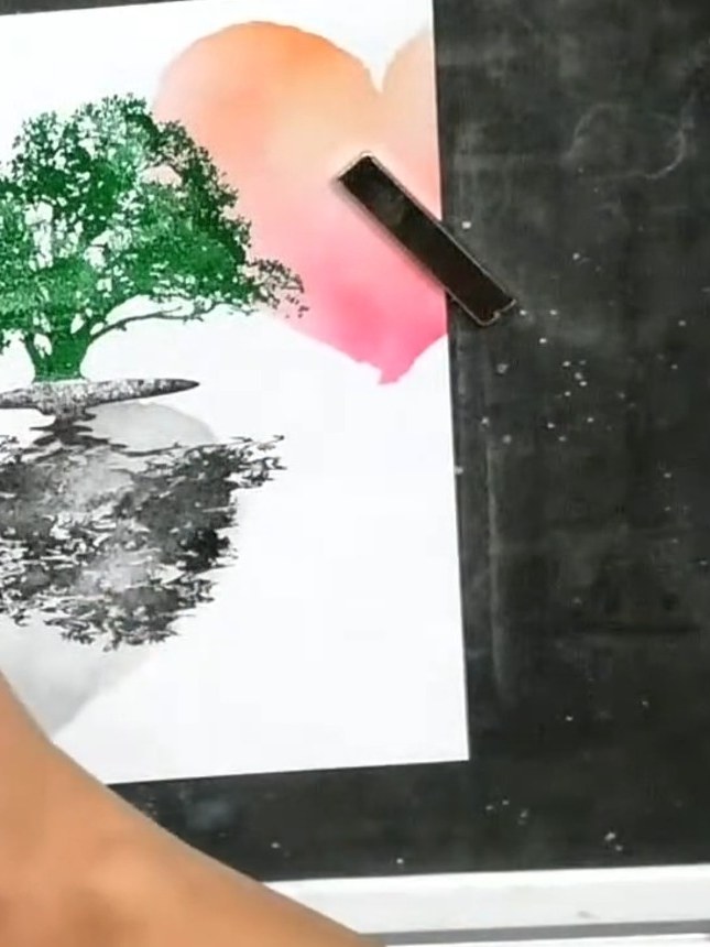 Step 7: Stamp your chosen sentiment or image onto the card, positioning it to work with both the coloured and monochro
