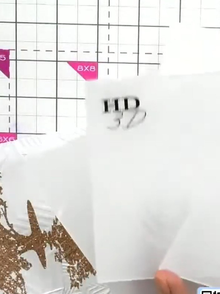 Step 3: Apply bronze sparkle ink over the embossed design using an ink pad, dabbing it across the raised pattern. Heat
