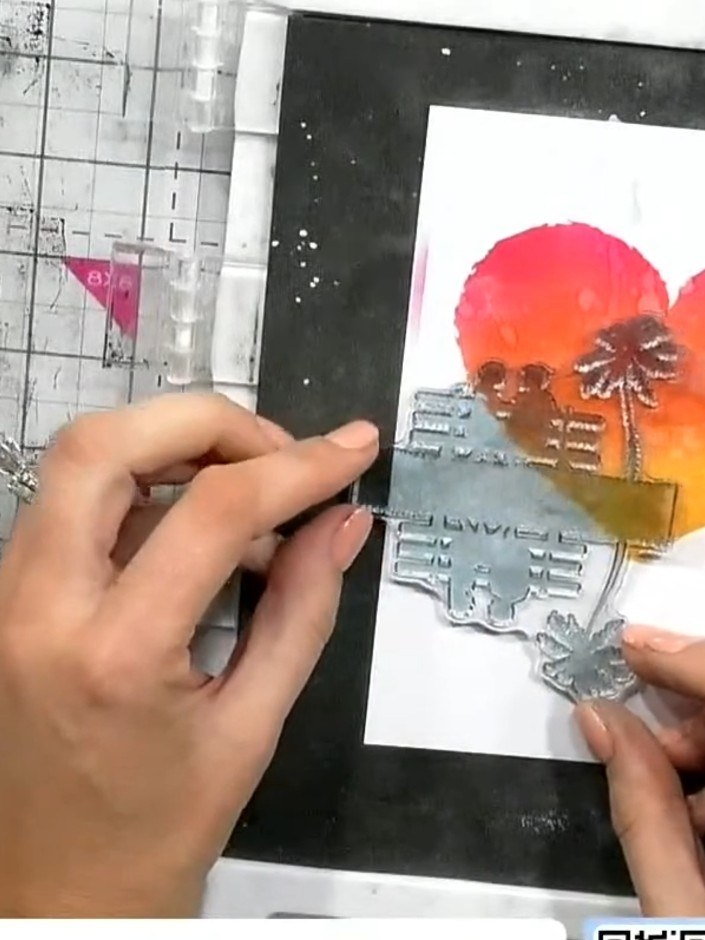 Step 7: Stamp the lady and gentleman silhouette over the ombré heart using black heat-set ink. Position the stamps to 