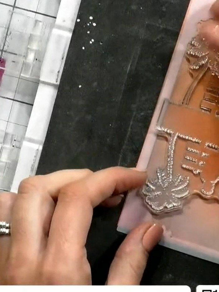 Step 4: Stamp the couple from the Better Together stamp set within the stencil frame, positioning them to appear as if