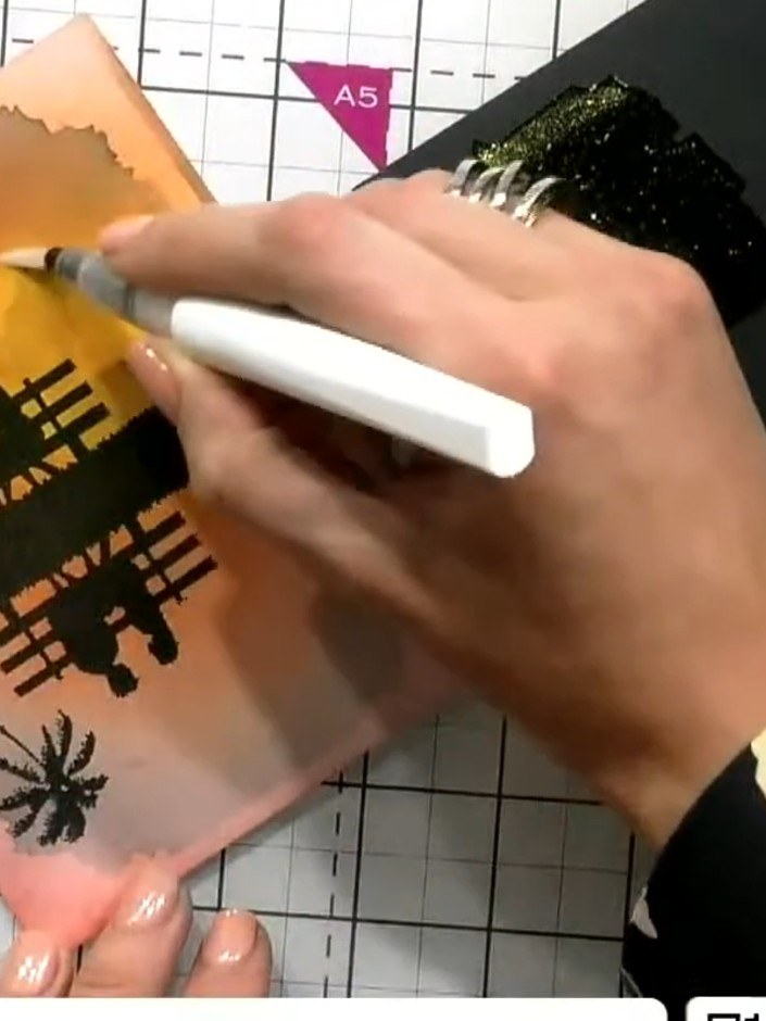 Step 6: Using a white pen or white ink, add highlights to the sunset area of your card to suggest light catching the w