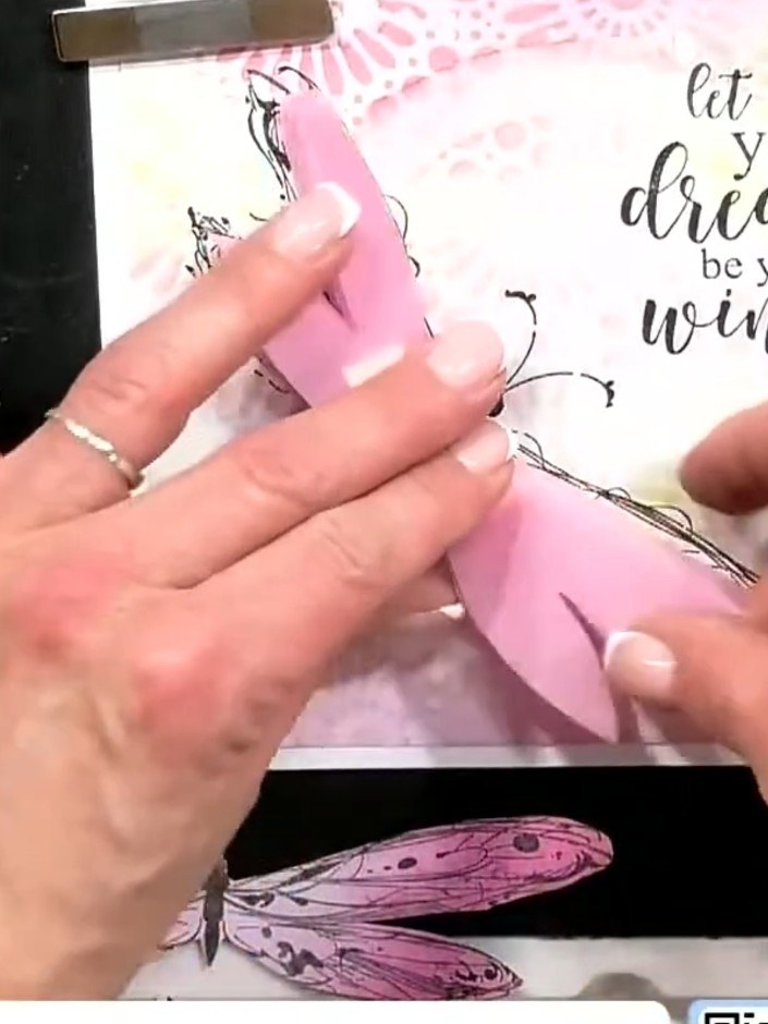 Step 4: Cut pink vellum to match the dragonfly wing shapes. Layer the vellum wings over the stamped wings using foam t