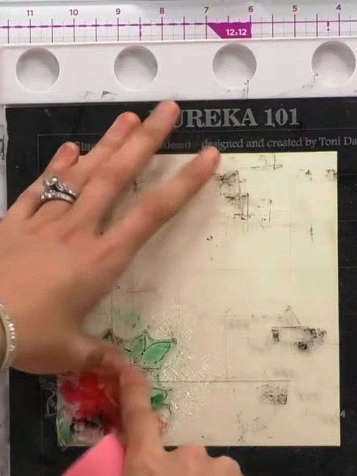 Step 3: Spray the stamped watercolour card with water to activate the watercolour effect. Apply water across the stamp