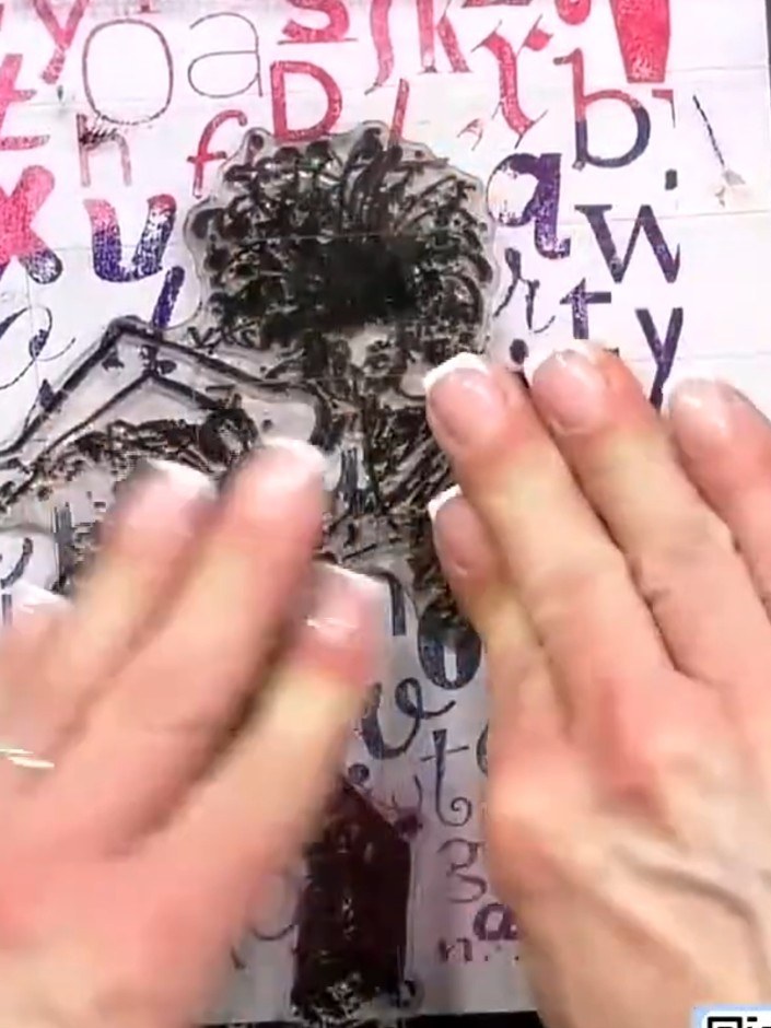 Step 5: Carefully peel away the mask from the stamped background to reveal the silhouette of the character against the