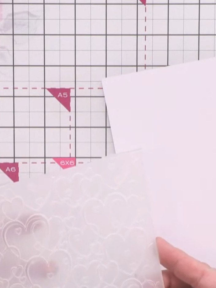 Step 1: Pre-cut a piece of white card to 5 by 7 inches (approximately 12.7 x 17.8 cm). This will be used as the base f