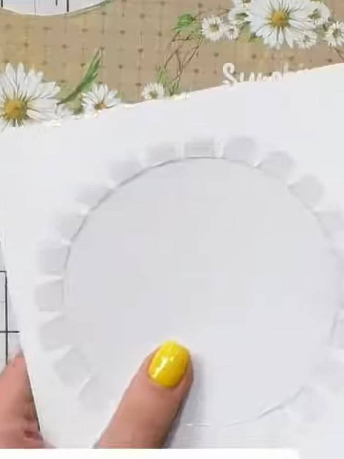 Step 2: Place the circle window over your desired design area on the card front and lightly trace around it with a pen