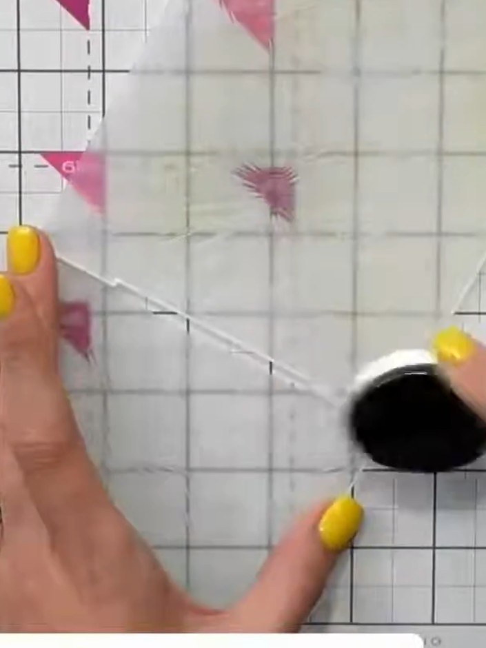 Step 4: Using a soft blending brush, lightly brush the green ink over the embossed butterfly details on the acetate wi