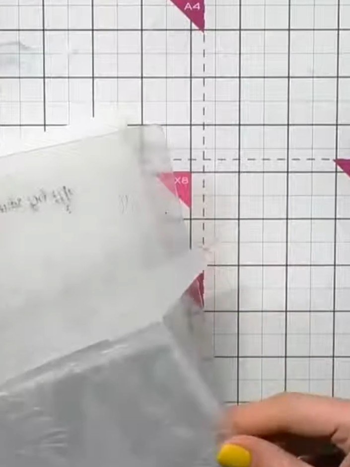 Step 2: Run the vellum with the stamped greenery design through your die-cutting machine to emboss the pattern. Use th