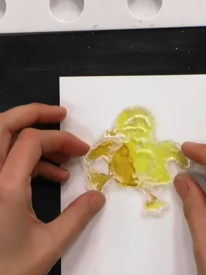 Step 8: Clean the solid stamp and use a blending brush or cloth to apply the detail portion with brown ink to add text
