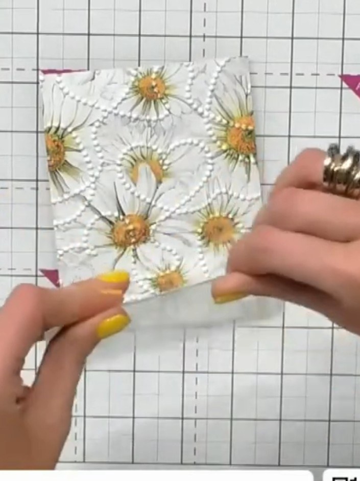 Step 2: Burnish the score line firmly with a bone folder or similar tool to create a crisp fold. This will make it eas