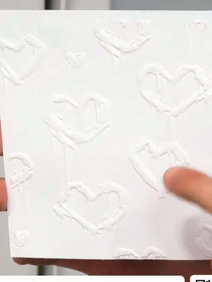 Step 4: Place your white cardstock inside the Frantic Floral 3D embossing folder. Run the folder through your die-cutt